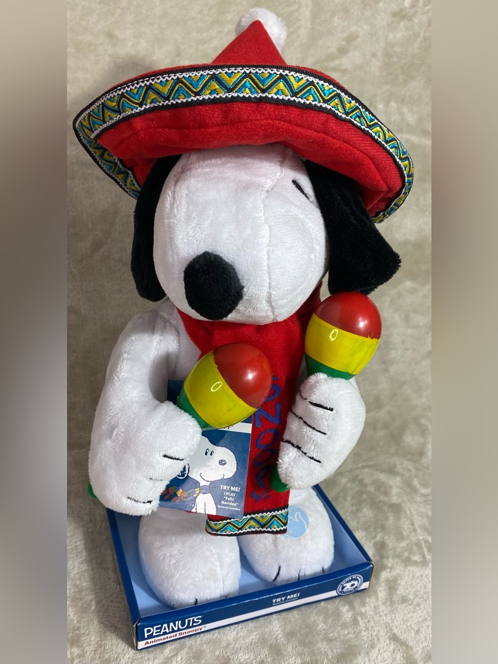 Peanuts Animated Christmas Snoopy with Maracas Plays Feliz Navidad Musical
